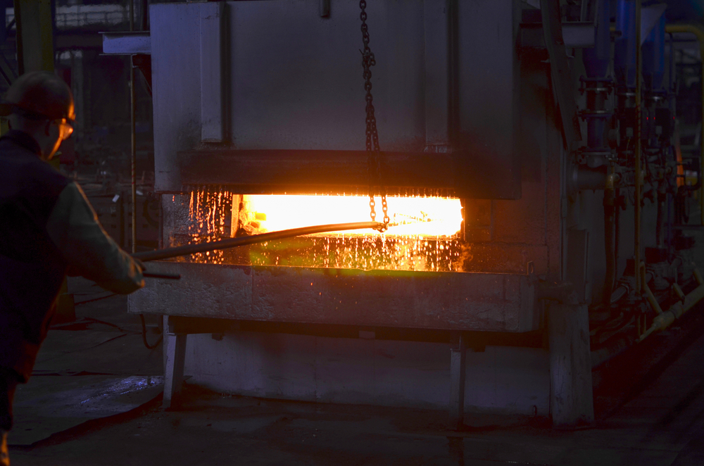 Steel,quenching,at,high,temperature,in,industrial,furnace,at,the